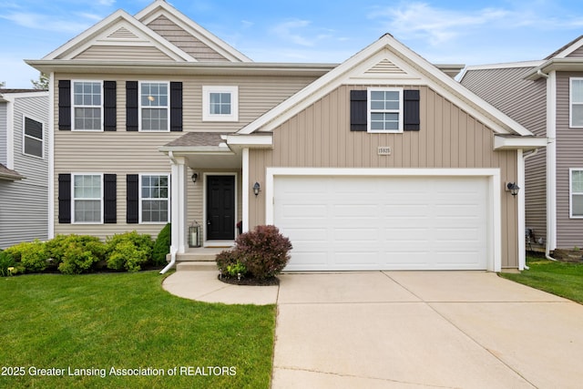 15925 Turnberry St, Lansing, MI 48906 - view of front of home featuring concrete driveway, a front yard, and an attached garage