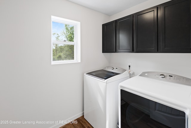 15925 Turnberry St, Lansing, MI 48906 - washroom featuring cabinet space, independent washer and dryer, and wood finished floors