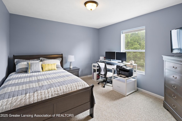 15925 Turnberry St, Lansing, MI 48906 - bedroom with an office area and carpet floors
