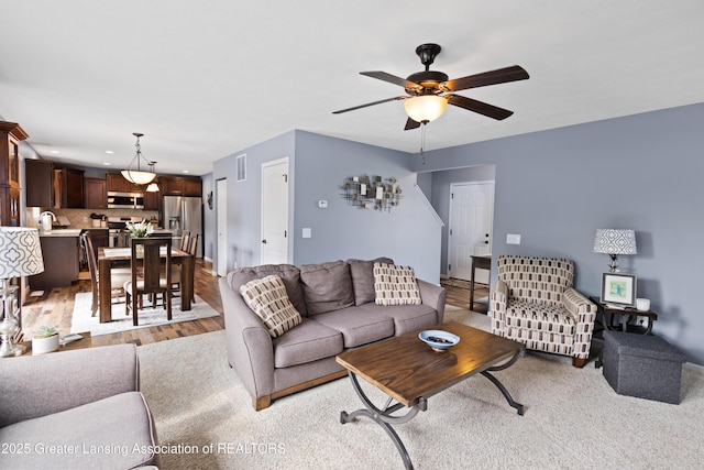 15925 Turnberry St, Lansing, MI 48906 - living area featuring ceiling fan, recessed lighting, and light wood-type flooring