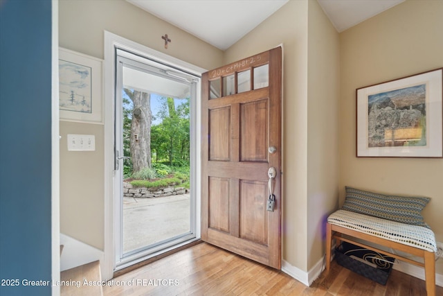 932 Sunset Ln, East Lansing, MI 48823 - entryway with light wood-style flooring and baseboards