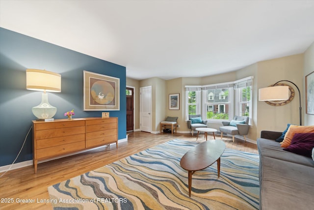 932 Sunset Ln, East Lansing, MI 48823 - living room with wood finished floors and baseboards