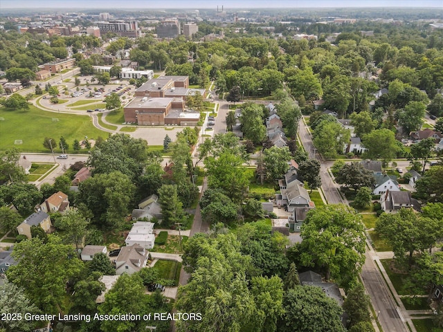 932 Sunset Ln, East Lansing, MI 48823 - view of property location with a tree filled landscape