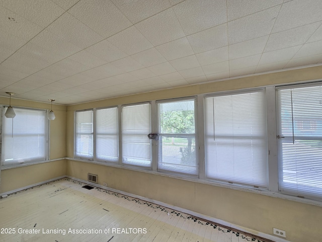 812 Westmoreland Ave, Lansing, MI 48915 - unfurnished sunroom featuring plenty of natural light