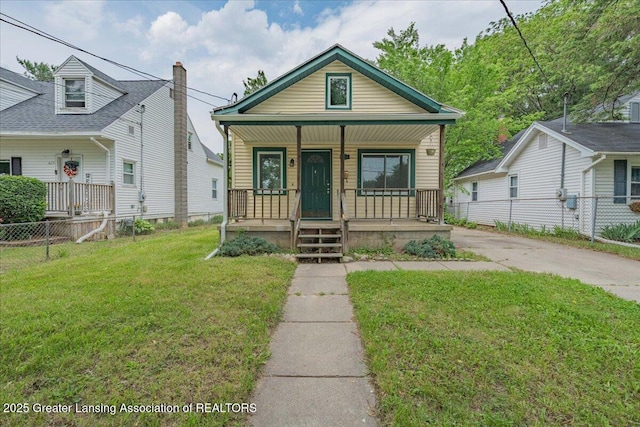 629 Emily Ave, Lansing, MI 48910 - view of front facade featuring covered porch