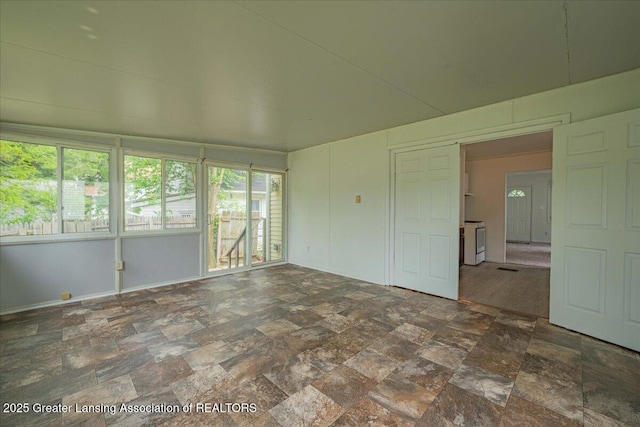 629 Emily Ave, Lansing, MI 48910 - unfurnished room featuring stone finish floors