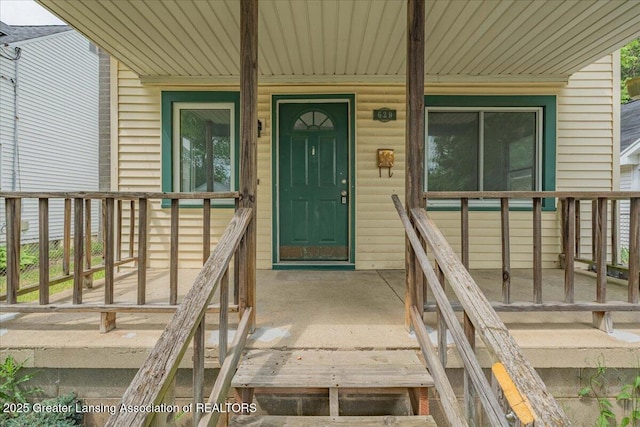 629 Emily Ave, Lansing, MI 48910 - view of exterior entry with a porch