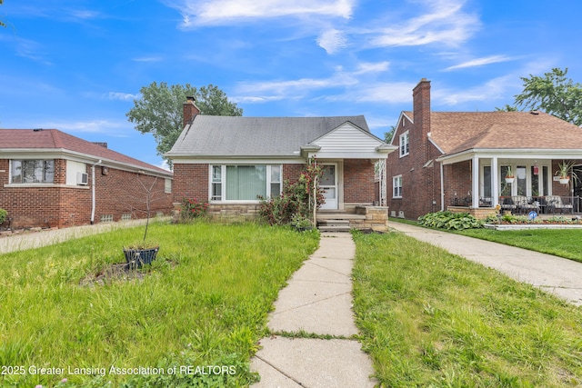 19326 Marlowe St, Detroit, MI 48235 - bungalow-style house featuring covered porch, a chimney, brick siding, and a front lawn