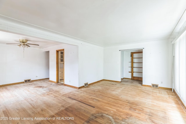 19326 Marlowe St, Detroit, MI 48235 - unfurnished room with light wood-style floors and a ceiling fan
