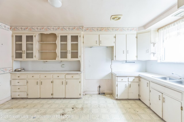 19326 Marlowe St, Detroit, MI 48235 - kitchen with light flooring, light countertops, and open shelves
