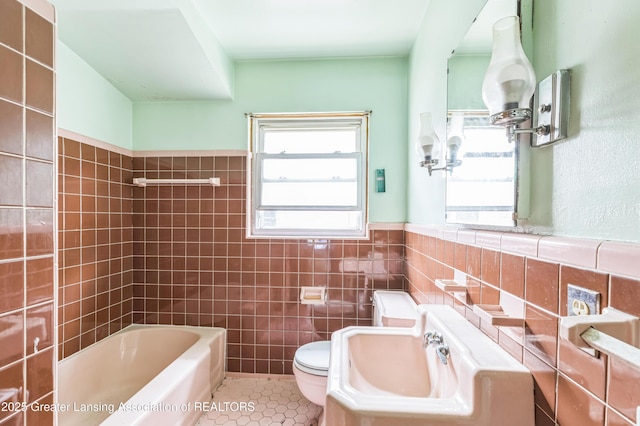 19326 Marlowe St, Detroit, MI 48235 - full bath with tile walls, tile patterned flooring, a wainscoted wall, and shower / tub combination
