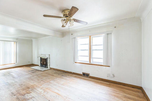 19326 Marlowe St, Detroit, MI 48235 - unfurnished living room featuring plenty of natural light, a ceiling fan, and wood finished floors