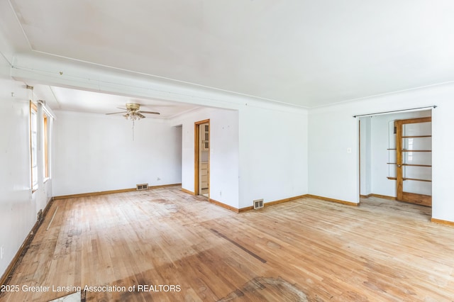 19326 Marlowe St, Detroit, MI 48235 - empty room with wood finished floors and ceiling fan