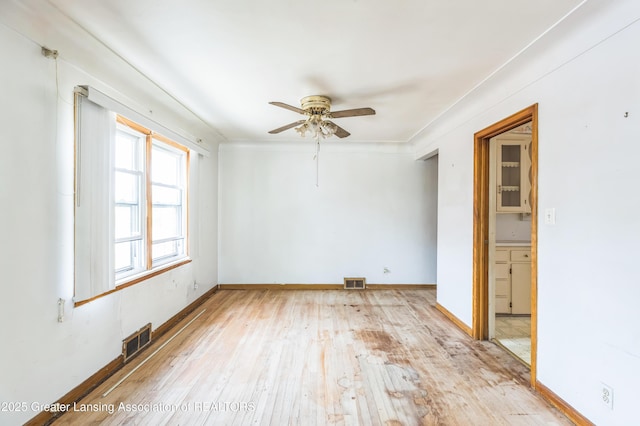 19326 Marlowe St, Detroit, MI 48235 - unfurnished room with ceiling fan, light wood-style flooring, and ornamental molding