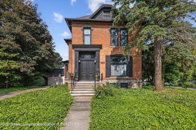 1035 N Capitol Ave, Lansing, MI 48906 - view of front of home featuring brick siding