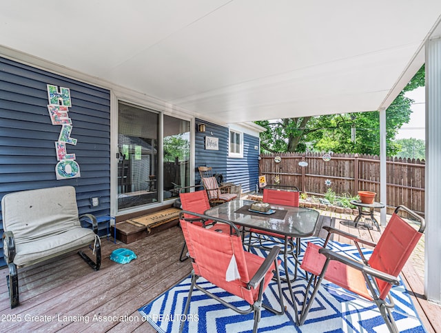 3701 Jerree St, Lansing, MI 48911 - wooden deck featuring outdoor dining space