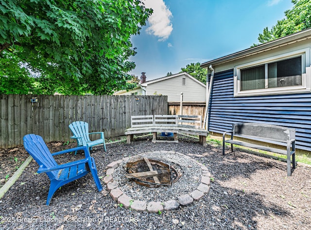 3701 Jerree St, Lansing, MI 48911 - view of yard featuring a fire pit