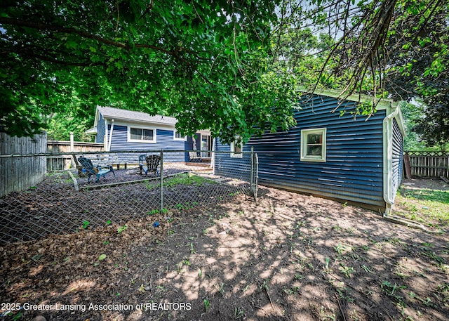 3701 Jerree St, Lansing, MI 48911 - rear view of property featuring a fenced backyard