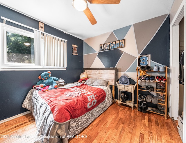 3701 Jerree St, Lansing, MI 48911 - bedroom with wood finished floors and ceiling fan