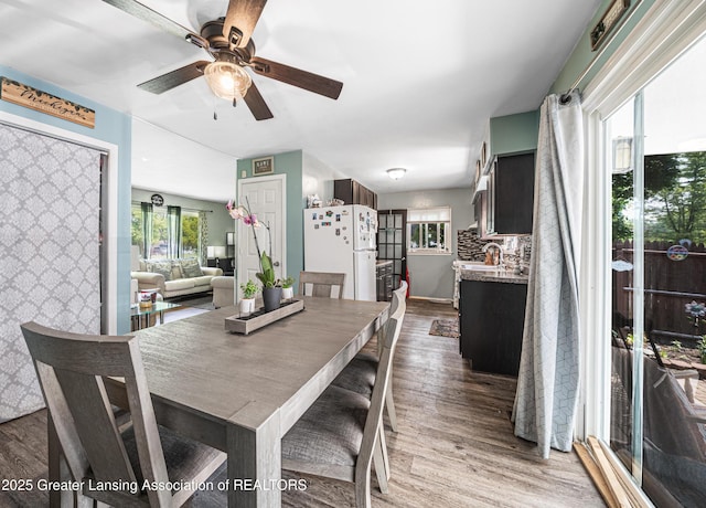 3701 Jerree St, Lansing, MI 48911 - dining room with dark wood-style flooring and ceiling fan
