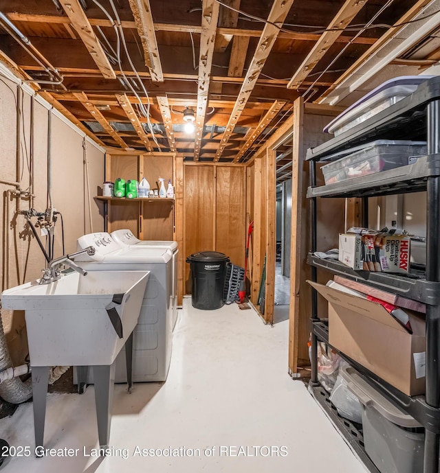 3701 Jerree St, Lansing, MI 48911 - unfinished basement featuring a sink and washing machine and dryer