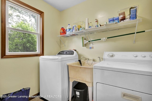 8767 Corrison Rd, Grand Ledge, MI 48837 - laundry area featuring washing machine and clothes dryer
