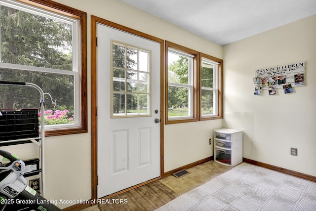 8767 Corrison Rd, Grand Ledge, MI 48837 - entryway featuring healthy amount of natural light