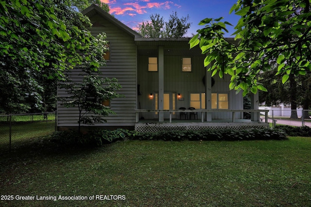 8767 Corrison Rd, Grand Ledge, MI 48837 - back of house with a porch