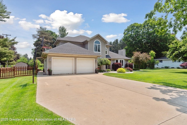 2020 Sunset Dr, Owosso, MI 48867 - traditional-style house featuring a garage, concrete driveway, and roof with shingles