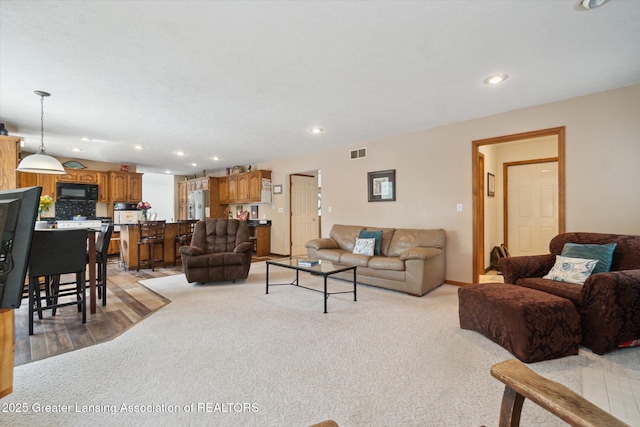 2020 Sunset Dr, Owosso, MI 48867 - living room featuring recessed lighting and light wood finished floors