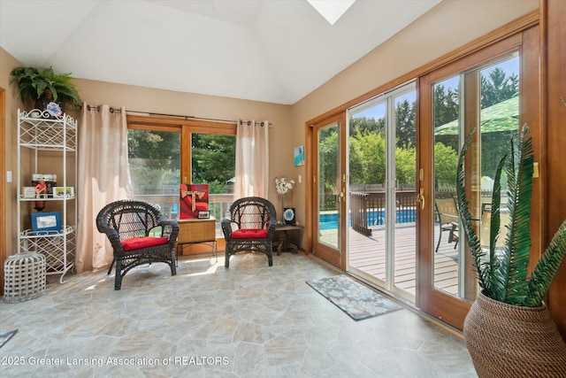 2020 Sunset Dr, Owosso, MI 48867 - sunroom / solarium with plenty of natural light, stone flooring, lofted ceiling, french doors, and a skylight