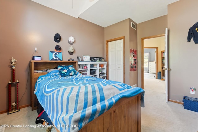 2020 Sunset Dr, Owosso, MI 48867 - bedroom featuring light colored carpet and a closet
