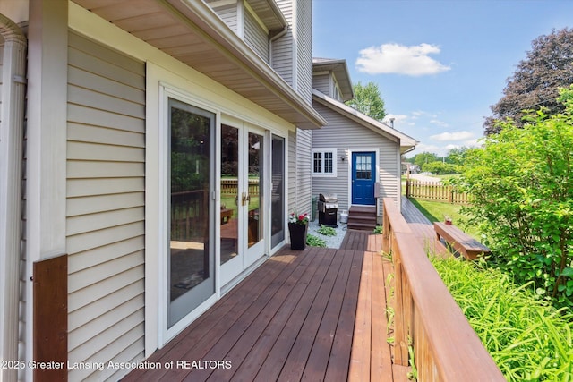 2020 Sunset Dr, Owosso, MI 48867 - deck with french doors and area for grilling