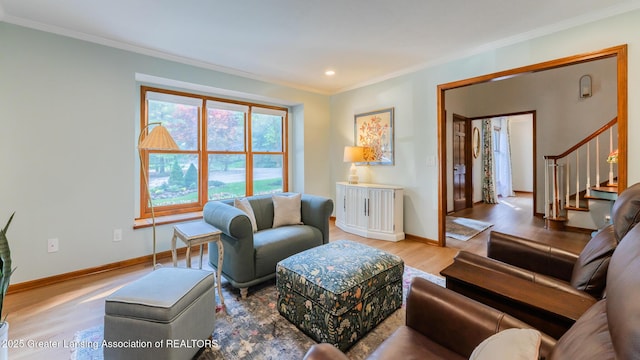 1117 Windreef Cir, Okemos, MI 48864 - living area with ornamental molding, light wood finished floors, stairway, and recessed lighting