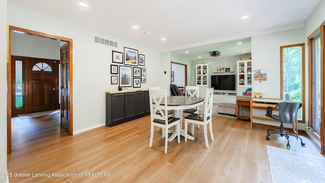 1117 Windreef Cir, Okemos, MI 48864 - dining room featuring light wood-style floors, recessed lighting, and a desk