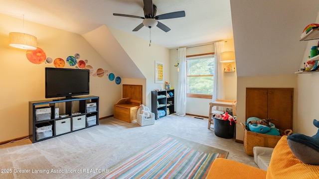 1117 Windreef Cir, Okemos, MI 48864 - carpeted living room with a ceiling fan and lofted ceiling