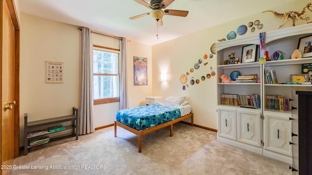 1117 Windreef Cir, Okemos, MI 48864 - bedroom with light colored carpet and ceiling fan