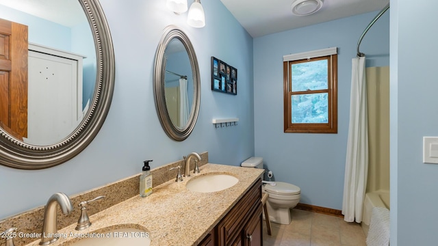 1117 Windreef Cir, Okemos, MI 48864 - bathroom with double vanity, tile patterned flooring, and shower / tub combo