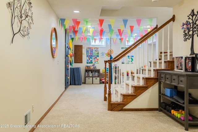 1117 Windreef Cir, Okemos, MI 48864 - staircase featuring carpet floors and recessed lighting