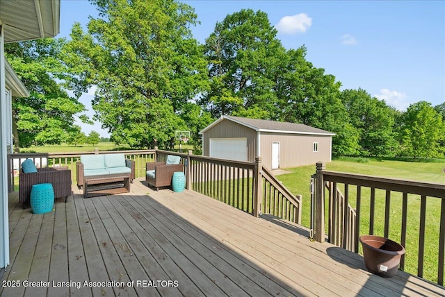 4905 E Green Rd, Saint Johns, MI 48879 - wooden deck featuring a detached garage, an outdoor living space, an outdoor structure, and a lawn