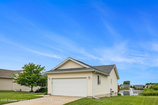 1262 Evans St, Mason, MI 48854 - view of property exterior with a lawn, driveway, and a shingled roof