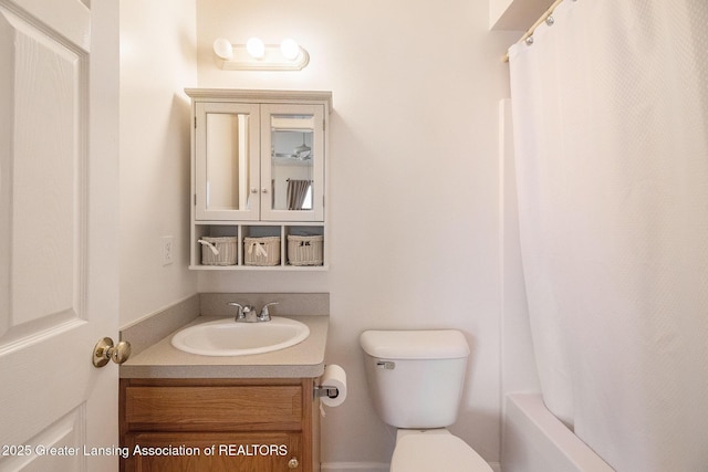 1262 Evans St, Mason, MI 48854 - bathroom featuring vanity and shower / tub combo