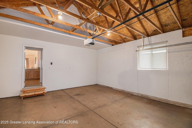 1262 Evans St, Mason, MI 48854 - garage with a garage door opener