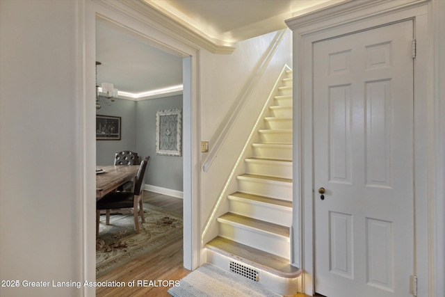 350 N Marshall Ave, Marshall, MI 49068 - stairway featuring wood finished floors and baseboards