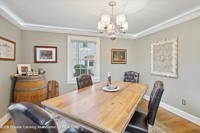 350 N Marshall Ave, Marshall, MI 49068 - dining area with a chandelier, light wood-style flooring, and ornamental molding