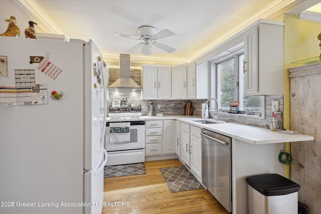 350 N Marshall Ave, Marshall, MI 49068 - kitchen with white appliances, wall chimney range hood, ceiling fan, backsplash, and light wood-type flooring