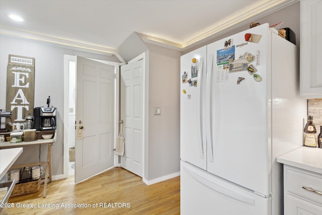 350 N Marshall Ave, Marshall, MI 49068 - entryway with light wood-style floors and baseboards