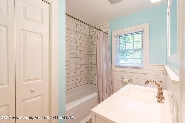 720 N Fairview Ave, Lansing, MI 48912 - bathroom with shower / bath combination with curtain and vanity