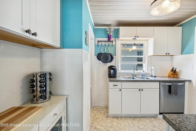 515 N Fairview Ave, Lansing, MI 48912 - kitchen with dishwasher, white cabinets, crown molding, tasteful backsplash, and pendant lighting