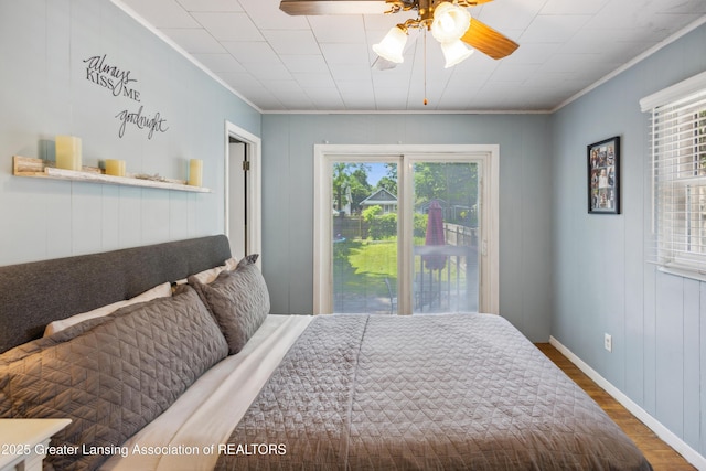 515 N Fairview Ave, Lansing, MI 48912 - bedroom featuring wood finished floors, crown molding, ceiling fan, and access to exterior